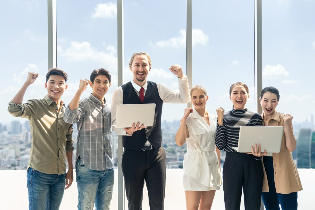 Group of business team have successful talk meeting stand in high rise skyscraper building